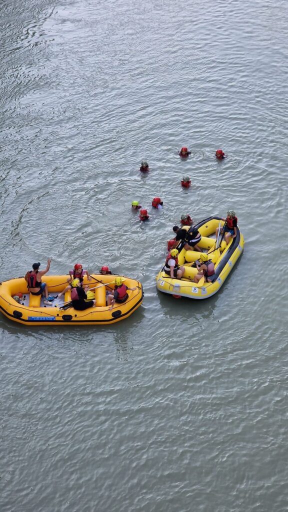 Rafters navigating exciting rapids on the Vjosa River canyon in Albania