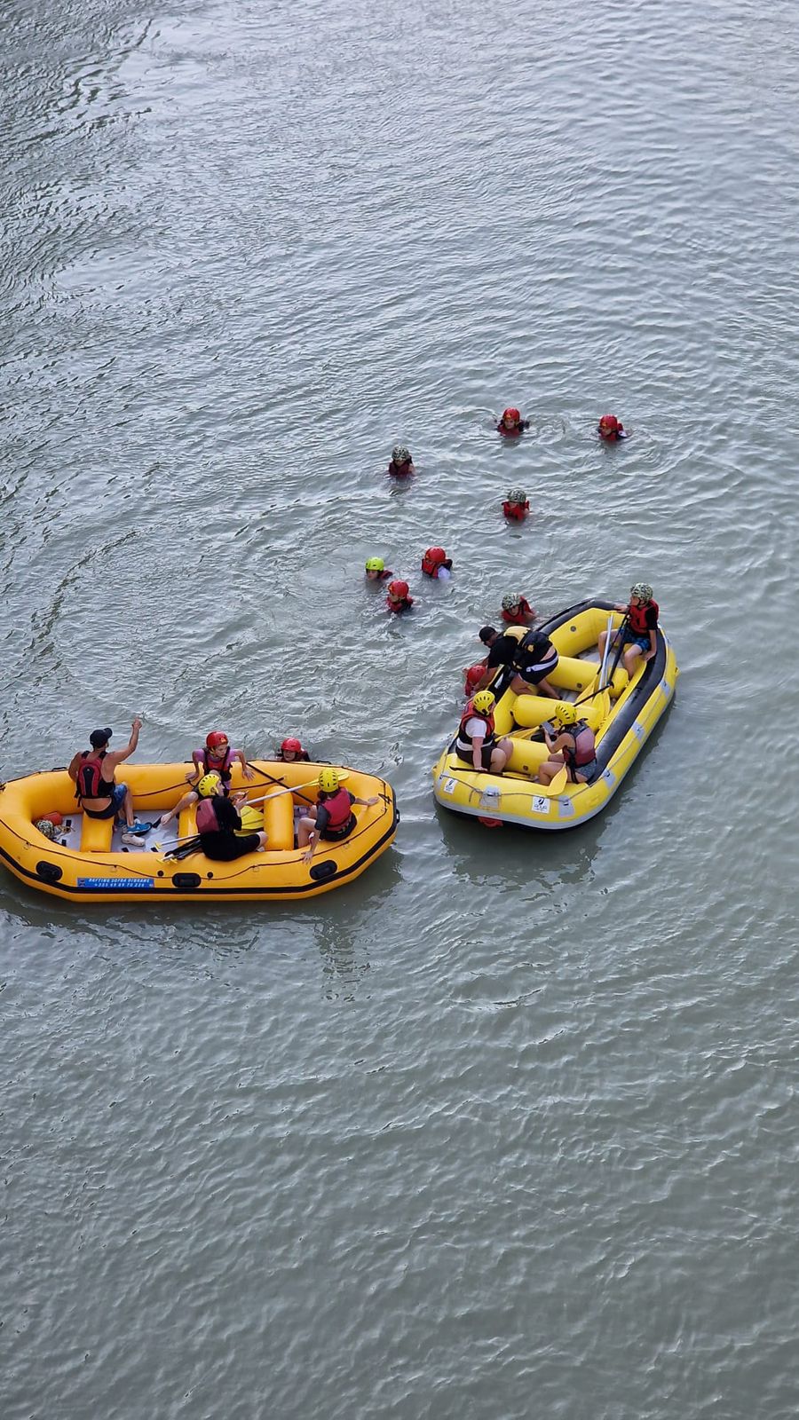Rafters navigating exciting rapids on the Vjosa River canyon in Albania